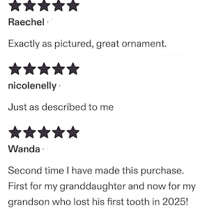 May include: A collection of five-star customer reviews displayed in black text on a white background. Each entry features five black stars followed by a username and a written comment regarding an ornament and a first tooth in 2025.