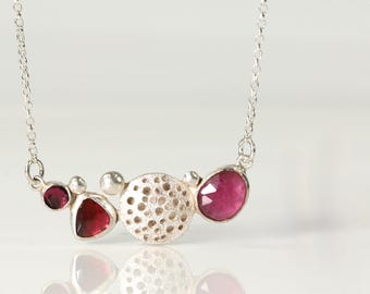 Handmade sterling silver 'dotty' multi-stone necklace with pink Thai sapphires.