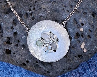 Statement, textured, sterling silver 'dish' pendant necklace.