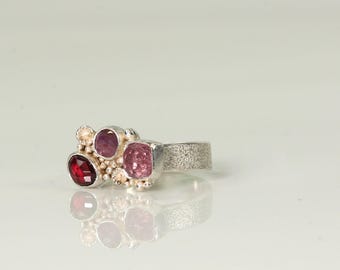 Handmade sterling silver multi-stone ring with pink sapphires