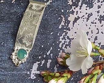 Unique, handmade sterling silver necklace with minty teal grandiderite stone.