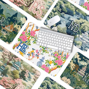 May include: Six different mousepads with various designs. The mousepads feature a floral pattern, a Japanese garden scene, and a pagoda. The mousepads are all rectangular and have a white background. The mousepads are all personalized with initials.