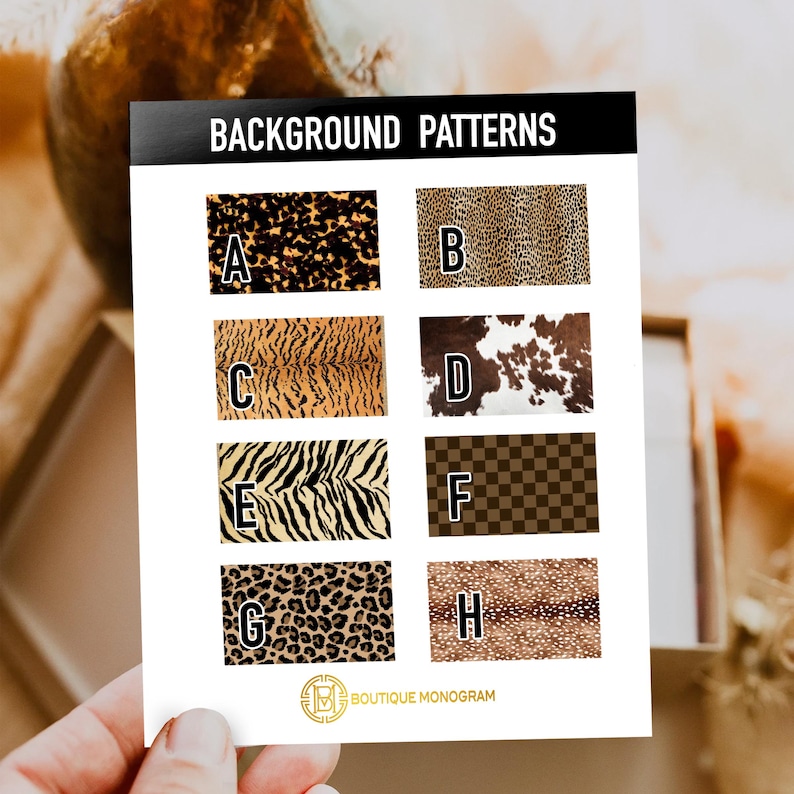 May include: A card displaying eight background patterns, including leopard, tiger, zebra, and cowhide prints. The card is labeled "BACKGROUND PATTERNS" and features the Boutique Monogram logo at the bottom. The patterns are labeled A through H.