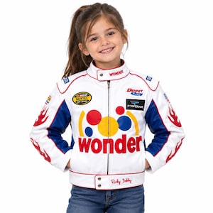 May include: A white racing jacket featuring blue sleeves with red flame graphics, a stand-up collar, and a full-length zip. The front displays the word "wonder" in red, "Ricky Bobby" on the hem, and various sponsor logos including NASCAR.