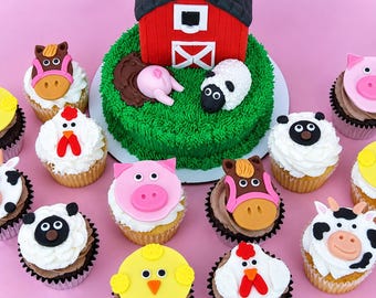 May include: A round cake topped with a red barn and green frosting grass, surrounded by cupcakes decorated with fondant farm animals including pigs, sheep, horses, chickens, and cows. The cake features a small pig and sheep on the green surface.