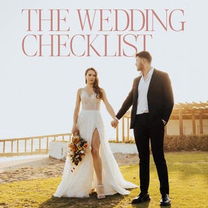 May include: A wedding checklist document featuring the text THE WEDDING CHECKLIST and ALL THE THINGS TO DO BEFORE I DO. The image shows a person in a white lace gown with a high slit and a person in a black suit holding hands on a grassy beach.