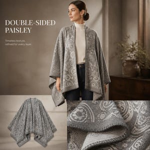 May include: A double-sided grey and white paisley patterned wrap featuring a textured knit fabric with a whipstitch edge. The garment is displayed as a draped open-front piece with a repeating intricate floral and teardrop motif throughout.