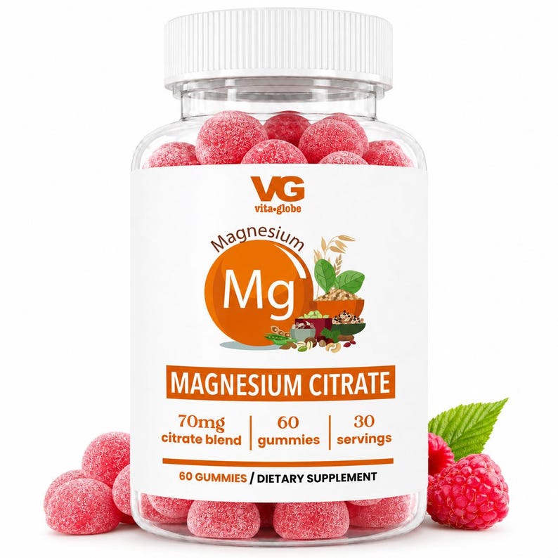 May include: A clear plastic bottle filled with red, sugar-coated magnesium citrate gummies. The label features the text VG vita-globe, Magnesium Mg, 70mg citrate blend, 60 gummies, 30 servings, and 60 GUMMIES / DIETARY SUPPLEMENT with fruit graphics.