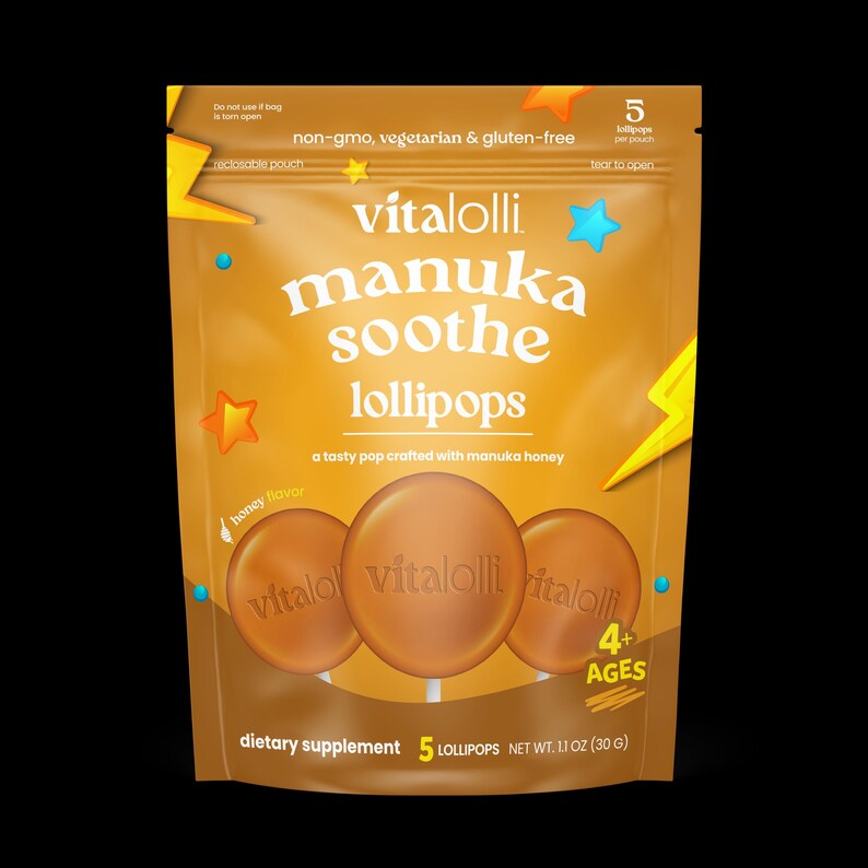 May include: A gold-colored resealable pouch of Vitalolli manuka soothe lollipops. The packaging features text including "manuka soothe lollipops," "a tasty pop crafted with manuka honey," "dietary supplement," and "net wt. 1.1 oz (30 g)." It shows three round lollipops.