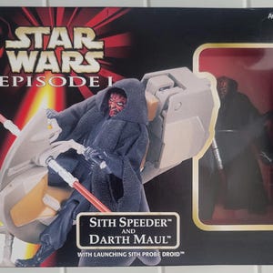 May include: A Star Wars Episode I Sith Speeder and Darth Maul action figure set in its original packaging. The box features a graphic of Darth Maul on a speeder with a red lightsaber, and a window showing the included Darth Maul action figure.
