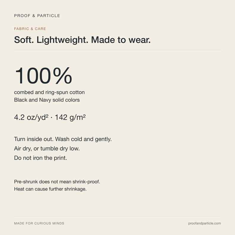 May include: A beige informational graphic titled Proof & Particle Fabric & Care. It lists 100% combed and ring-spun cotton for black and navy colors, a weight of 4.2 oz/yd2, and care instructions including washing cold and air or tumble drying.