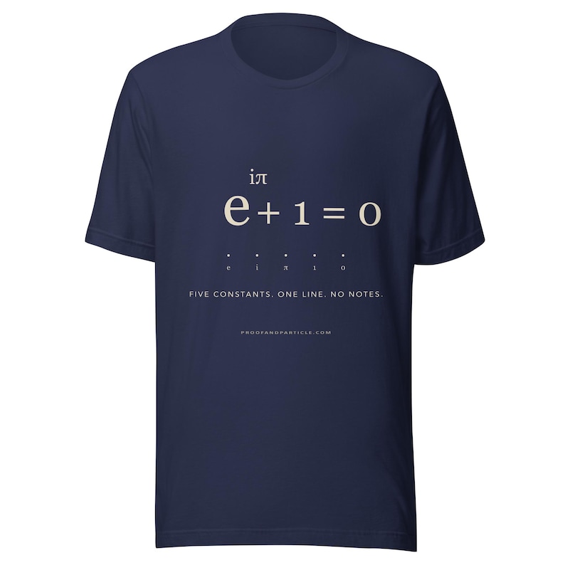 May include: A navy blue short-sleeve t-shirt featuring the mathematical equation e to the power of i times pi plus one equals zero in white text. Below the equation are five dots and the text FIVE CONSTANTS. ONE LINE. NO NOTES. PROOFANDPARTICLE.COM.