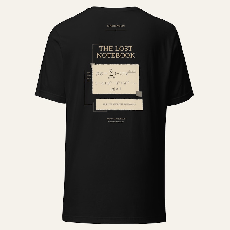 May include: A black short-sleeved t-shirt featuring a graphic on the back. The design includes the text THE LOST NOTEBOOK, a mathematical summation formula, and the phrase RESULTS WITHOUT ROADMAPS printed on beige paper-like rectangular shapes.