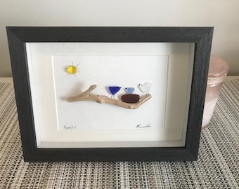 Bird sea glass and driftwood art framed