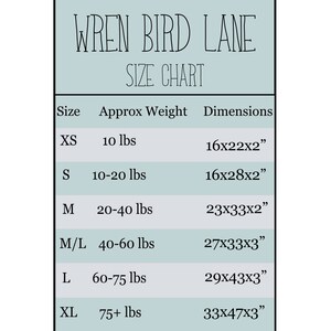 May include: Size chart for Wren Bird Lane clothing, showing sizes XS through XL with corresponding weight ranges and dimensions in inches.