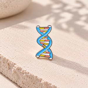 May include: A metal enamel pin shaped like a DNA double helix. The structure features two light blue spiraling strands connected by horizontal rungs colored in alternating segments of white, yellow, and coral pink, with a polished silver metal outline.