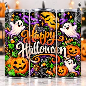 May include: A cylindrical tumbler with a metal straw featuring a black background with a colorful Halloween pattern including orange jack-o'-lanterns, white ghosts, purple clouds, yellow stars, spiderwebs, and the text Happy Halloween in orange.