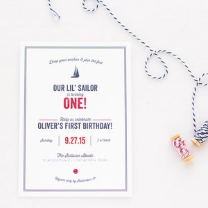 May include: A nautical-themed first birthday party invitation with a blue sailboat graphic and red text that reads "Our Lil' Sailor is turning ONE!"  Help us celebrate Oliver's First Birthday! Sunday 9.27.15 | 2 o'clock The Sullivan Abode 16 Jackson Ave - Fort Worth, Texas RSVP only by September 17th