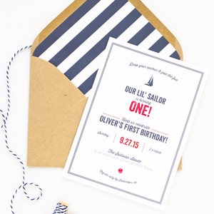 May include: A nautical-themed birthday invitation with blue and white stripes on the envelope. The invitation reads "Drop your anchor & join the fun. Our Lil' Sailor is turning One! Help us celebrate Oliver's First Birthday! Sunday 9.27.15 2 o'clock The Sullivan Abode 16 Jackson Ave. Fort Worth, Texas. Regrets only by September 17th."