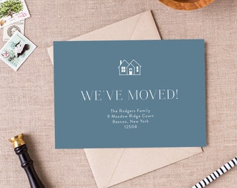 May include: A blue card with a white silhouette of two houses and the text "WE'VE MOVED!"  The Rodgers Family, 9 Meadow Ridge Court, Beacon, New York 12508.
