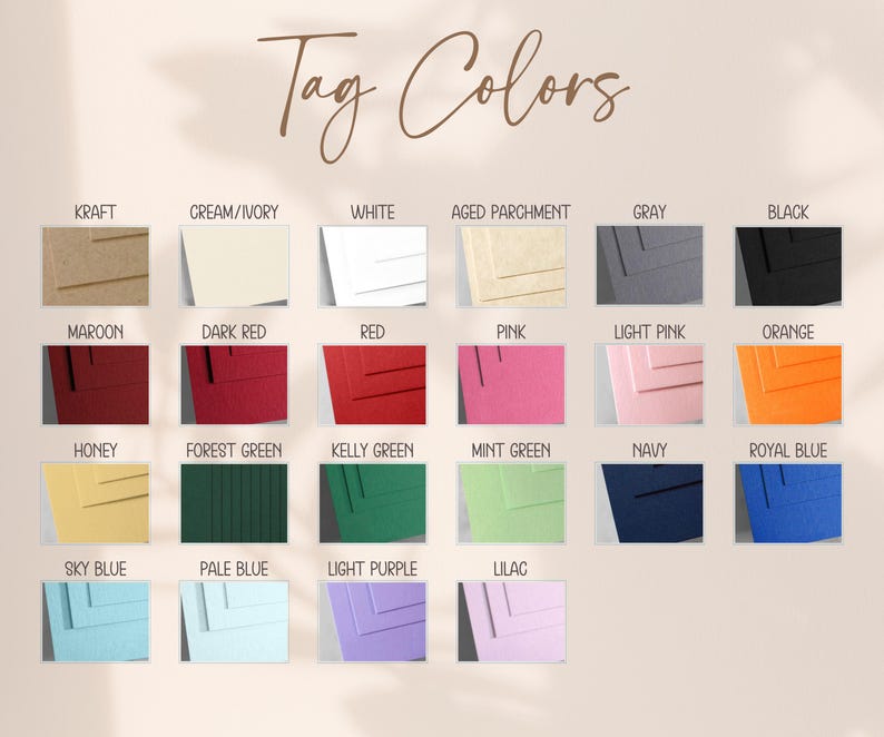 May include: A color chart titled Tag Colors displaying twenty-two rectangular paper samples in various shades including kraft, cream, white, aged parchment, gray, black, maroon, dark red, red, pink, light pink, orange, honey, forest green, kelly green, mint green, navy, royal blue, sky blue, pale blue, light purple, and lilac.
