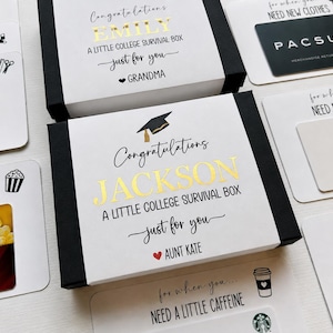 May include: Two black and white gift boxes labeled A LITTLE COLLEGE SURVIVAL BOX with gold foil names EMILY and JACKSON, accompanied by white cards with black text and icons for various needs, including gift cards for PacSun, Apple, and AMC.