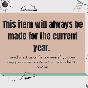 May include: A beige rectangular sign with the text "This item will always be made for the current year." Decorative elements include a sun, clouds, and a paper airplane. The text below says to leave a note for previous or future years.