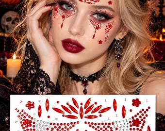 May include: A sheet of adhesive face gems featuring red and clear crystals arranged in floral and teardrop patterns. The set includes various sizes of round, marquise, and flower-shaped rhinestones designed for application on the forehead and cheeks.