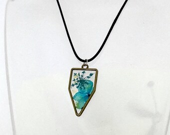 Pressed Blue Flower Pendant Necklace, Shield Shape Resin Botanical Pendant, Brass Tone Nature Jewelry