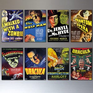 May include: A collection of eight vintage horror movie posters featuring classic films including I Walked With a Zombie, The Wolf Man, Dr. Jekyll and Mr. Hyde, Phantom of the Opera, Frankenstein, Dracula, and The Bride of Frankenstein.