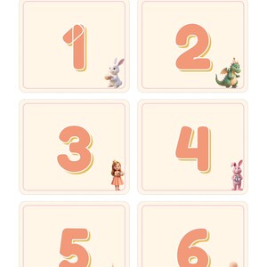 May include: A printable sheet of six rectangular age cards labeled 1 through 6 in coral font. Each card features a small illustration: a white rabbit, a green dragon, a girl in a dress, a pink rabbit, a tiered cake, and three balloons.