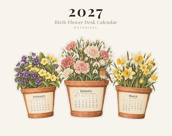 Op de afbeelding: Een 2027 geboortebloem-bureaukalender met drie terracotta potten met illustraties van februari-viooltjes, januari-anjers en maart-narcissen. Elke pot toont een maandkalender. Tekst: 2027 Birth Flower Desk Calendar, 12 cut-out cards A4 + US Letter.