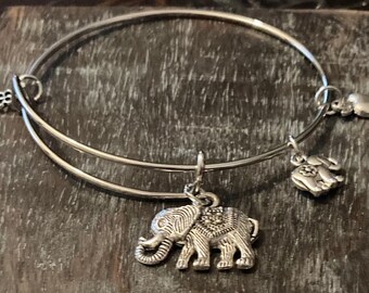 Expandable stainless-steel Elephant bangle bracelet with four Tibetan silver charms