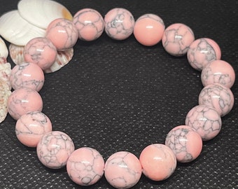 Pink Howlite large (10mm) Beaded 7””  Stackable Bracelet made with pink and gray Howlite.