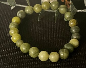 Jade gemstone stackable Bracelet 7”. Unisex.  Hippie boho bracelet. Stackable. Bohemian beaded bracelet.