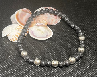 Diffuser Bracelet, 6.5”, black Lava rock with silver ball spacers.  Stacked bracelets.  Boho hippie bracelet.