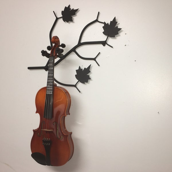 Quantity of 4.    Branch shaped Single Violin racks  with Maple leaves and bow holders .