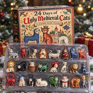 May include: A 24 Days of Ugly Medieval Cats advent calendar box featuring illustrations of cats, with a clear plastic tray containing 24 small, distinct feline figurines in various colors, poses, and medieval-inspired costumes.