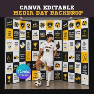 May include: A Canva editable media day backdrop featuring a black, white, and yellow checkerboard pattern with sports-themed graphics and motivational text. The design includes icons of tigers, soccer balls, trophies, and foam fingers.