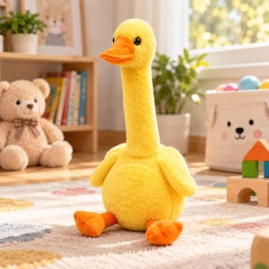 May include: A plush yellow duck toy with a long neck, soft textured fur, and bright orange feet and beak. The stuffed animal features small black eyes and is positioned in a sitting posture, showcasing a rounded body and upright head design.
