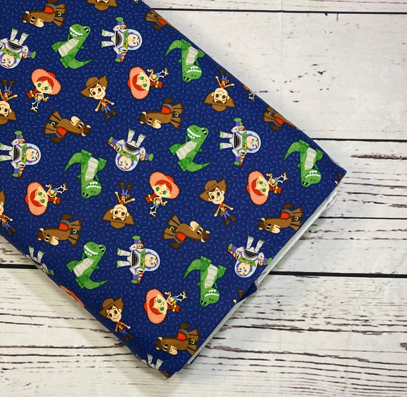 Toy Story Navy Fabric by Camelot Fabrics, Sold in 1/2 yard increments, Fabric by the Yard image 1