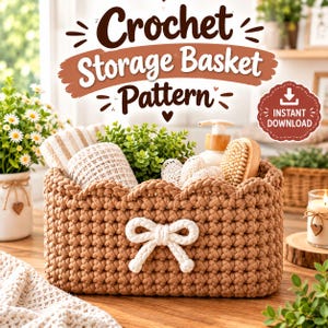 May include: A rectangular tan crochet storage basket with a scalloped top edge and a white crocheted bow on the front. The text above reads Crochet Storage Basket Pattern and a circular badge states Instant Download with a downward arrow icon.