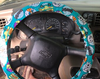 Lined cotton fabric steering wheel cover for 15 inch steering wheel.