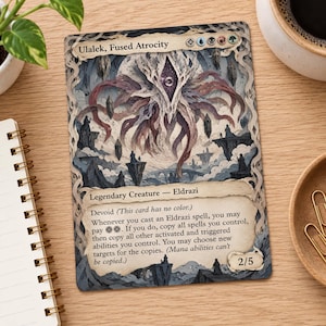 May include: A rectangular trading card titled Ulalek, Fused Atrocity, featuring a multi-colored creature with tentacles and a central eye. The card displays text describing its abilities, the creature type Legendary Creature Eldrazi, and a 2/5 power and toughness rating in the bottom right corner.