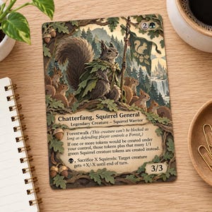 May include: A rectangular trading card titled Chatterfang, Squirrel General, featuring a central squirrel warrior in a green leaf cloak holding a flag. The card displays game text, a 3/3 power and toughness, and a forest background with acorns.