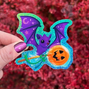 Baby Fruit Bat and his Halloween treat - holographic glitter waterproof vinyl sticker