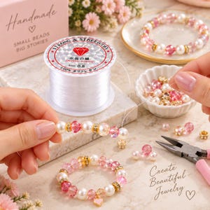 May include: A spool of clear 0.8 mm elastic crystal string with a holographic label, alongside pink and white beads, a finished beaded bracelet, and metal pliers. The spool features text including "STRONG & STRETCHY" and "CRYSTAL STRING".
