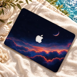 May include: A laptop skin featuring a dark night sky with a crescent moon and stars above a layer of dense clouds illuminated by vibrant orange and red sunset hues, centered with a white Apple logo cutout on the rectangular device.