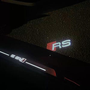 Projektor LED do drzwi Audi z logo, oświetlenie kałuży Plug & Play (2 szt.)