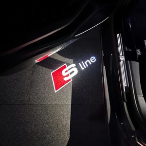 Audi LED-dörrprojektorlogotyplampor, plug & play-ljus för instegspöl (2 st)